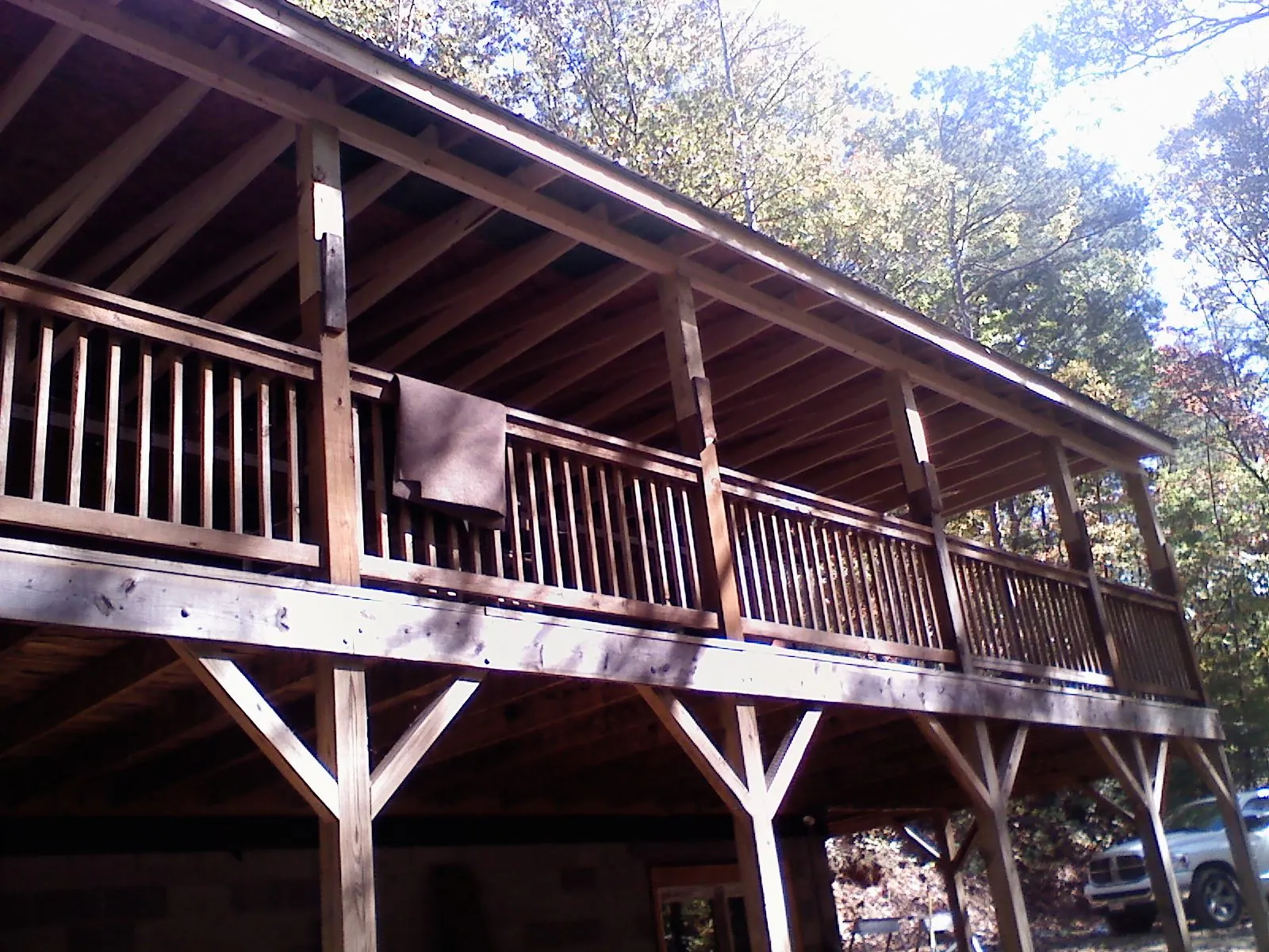 Timber framing under a new elevated porch and deck — Roof Leak Repair in Brenham by Roofing Brothers